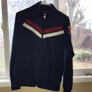 red socks turtle neck zip up jacket